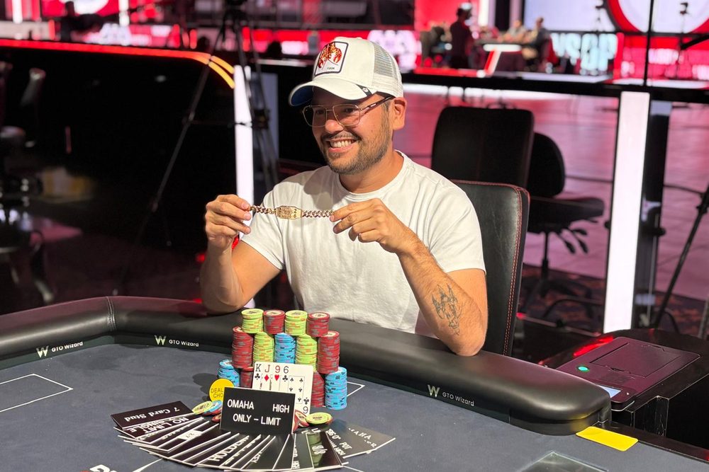 A player stacking chips at a World Series of Poker table